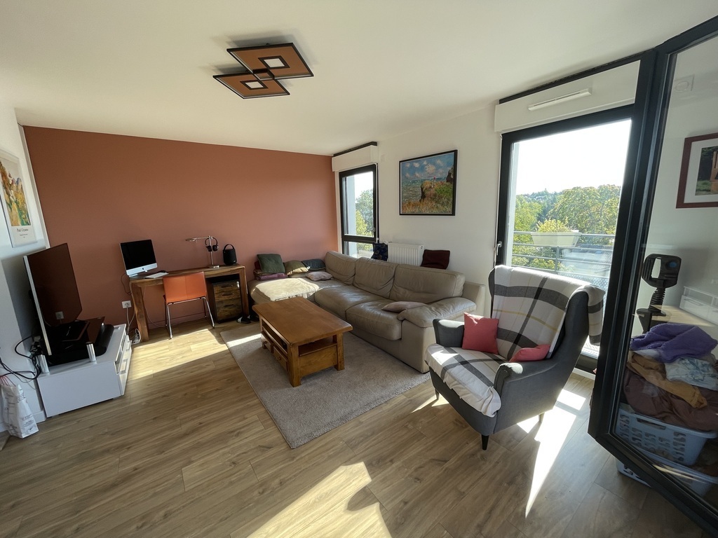 Upstairs, the living-room from the terrace.