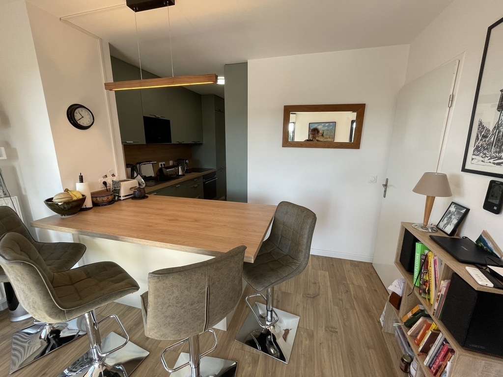 Upsairs, the kitchen from the living-room.