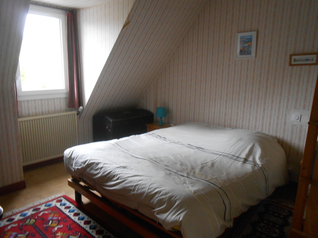 one of the three bedrooms upstairs