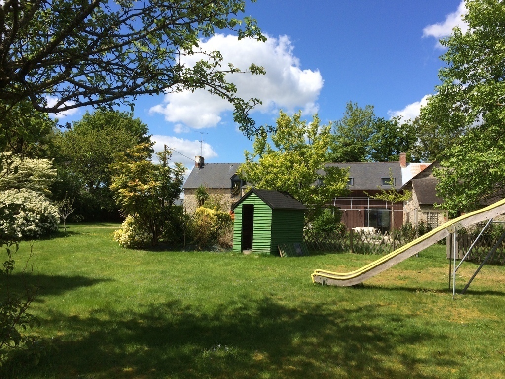 The large garden with trees and plants