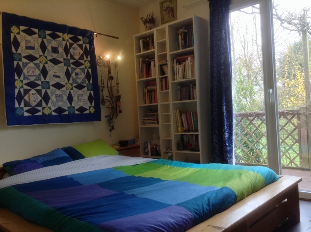 double room on the ground floor opening to the patio