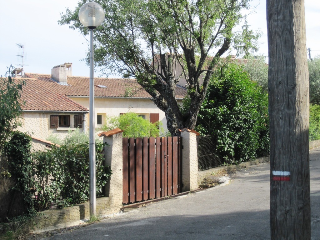 Our home is on a long distance footpath (white & red signs)