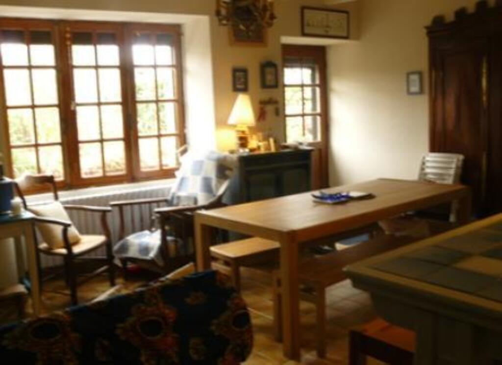 Principal sunny room (dining room, lounge and kitchen) over looking on the garden