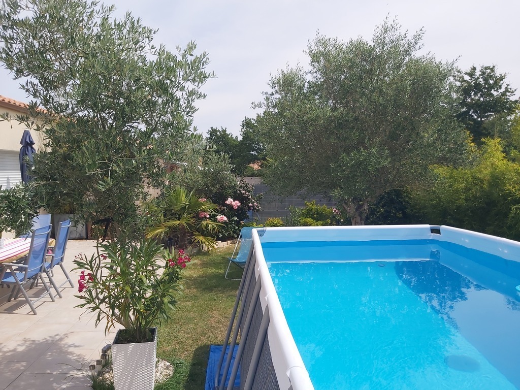 Pool in the garden at the end of Spring and in Summer 