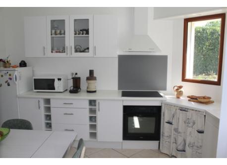 The kitchen. All is very practical. All necessary is there to do good meals....