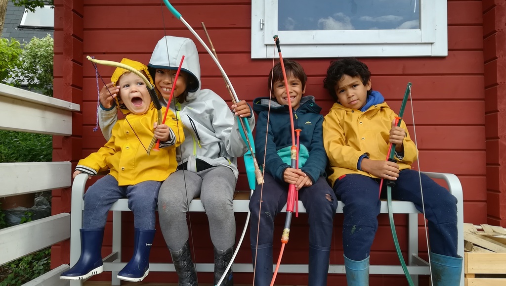 our four grand-children who like come at home 