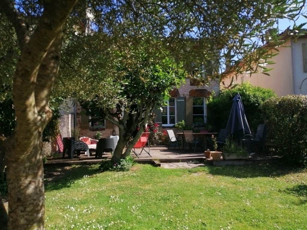 Maison ancienne et chaleureuse