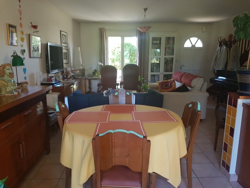 The dining room and the living room. 