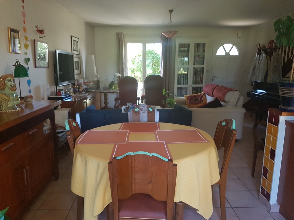 The dining room and the living room. 