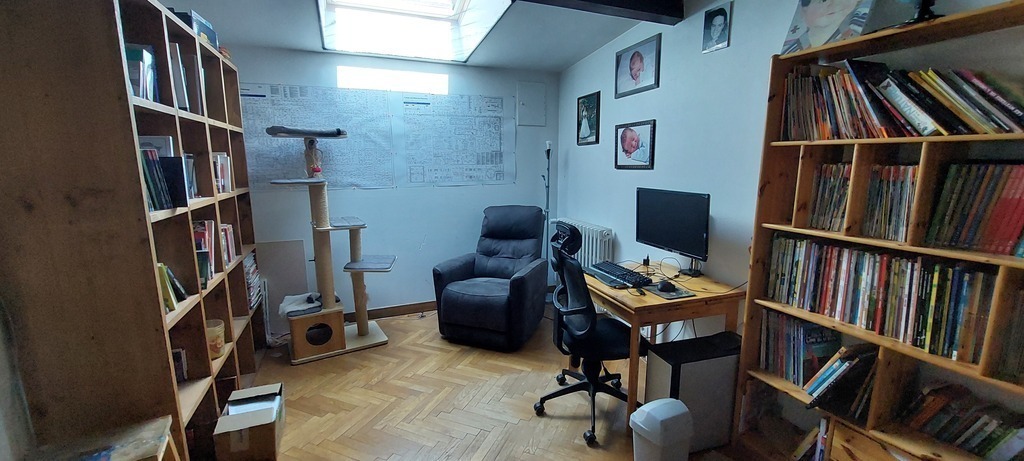 Mezzanine with reading space and computer (available to guest if needed).