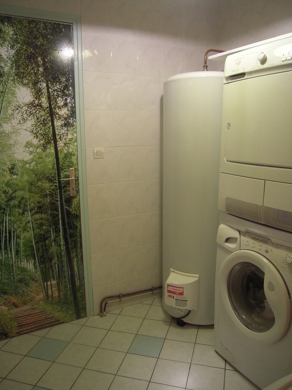 LAUNDRY WITH WASHING MACHINE AND TUMBLE-DRYER