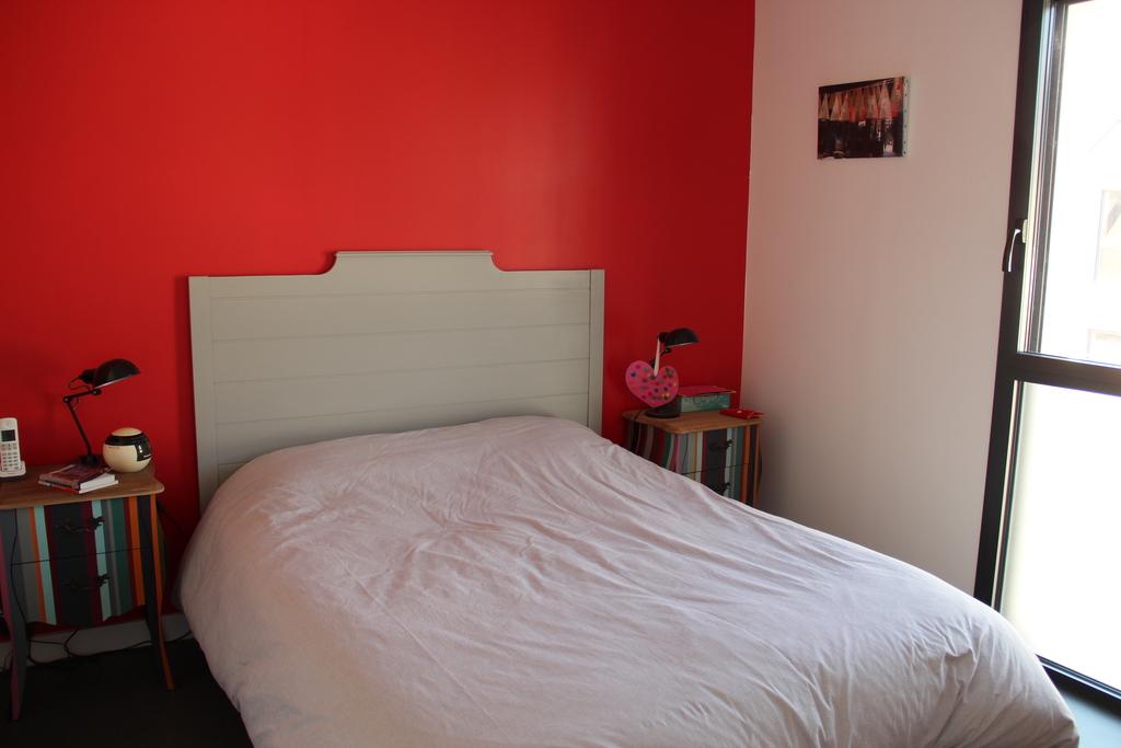 Parent's bedroom with double bed and dressing