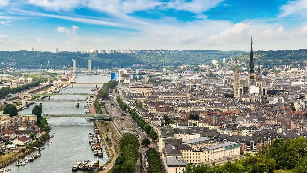 Rouen, 1 hour 20 min drive.