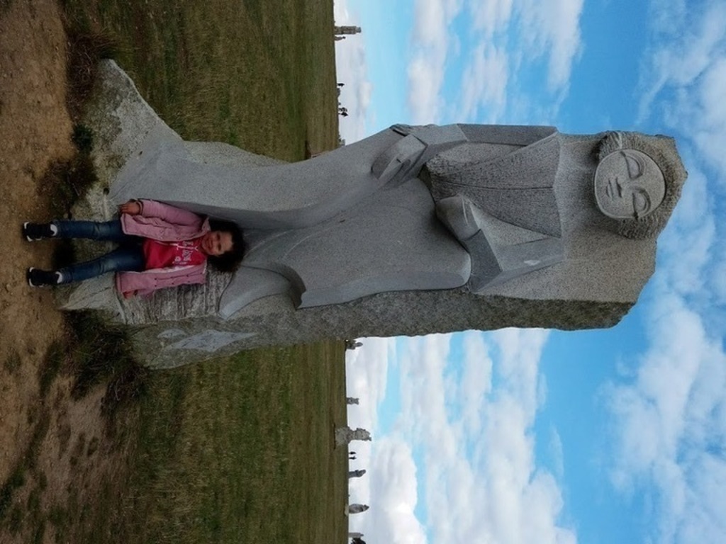 Enora next to the statue of Saint Enora at the Vallée des Saints ( 50 minutes from Saint Brieuc)