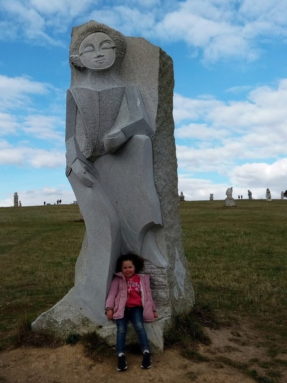 Enora next to the statue of Saint Enora at the Vallée des Saints ( 50 minutes from Saint Brieuc)