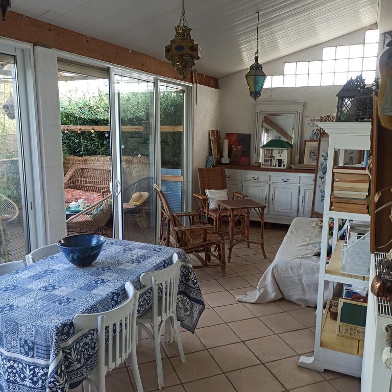 the veranda  is opened on a terrace and the garden 