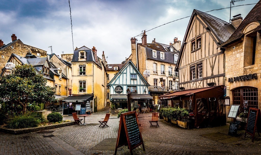 Vaugueux street in historic center of Caen with many small restaurants