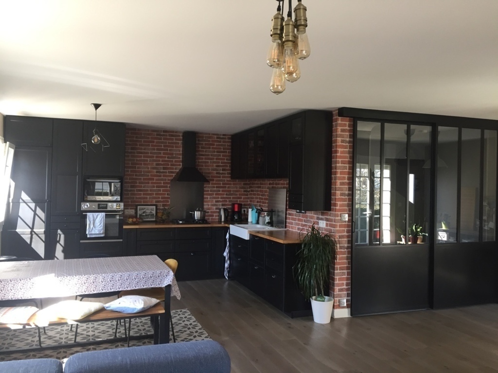 Kitchen with dining and living room