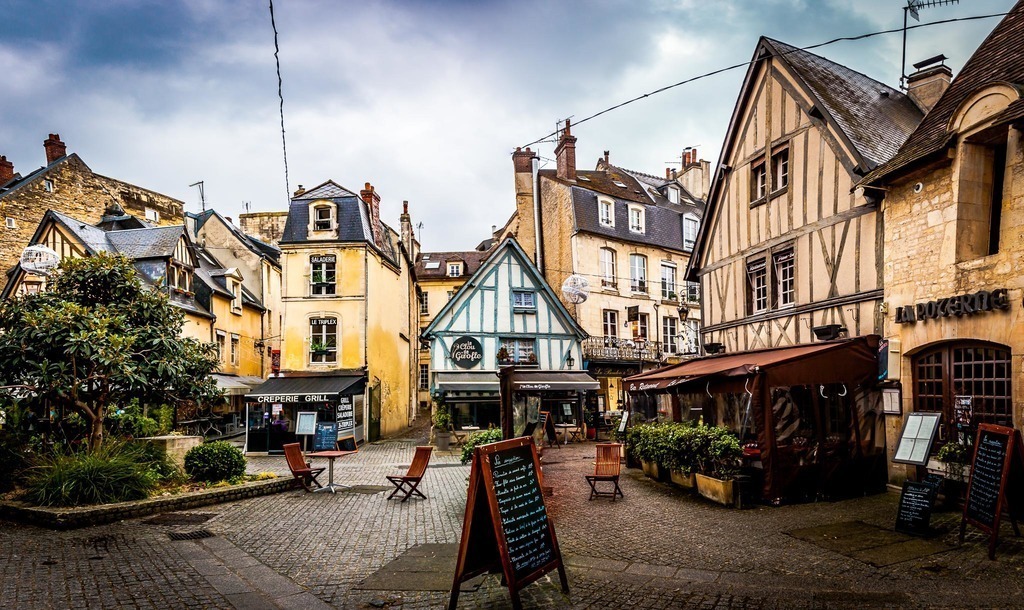 Vaugueux street in historic center of Caen with many small restaurants