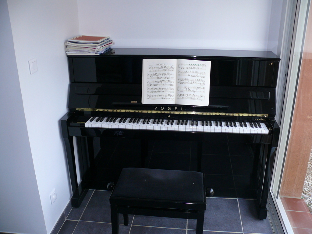 piano (in bedroom 2)