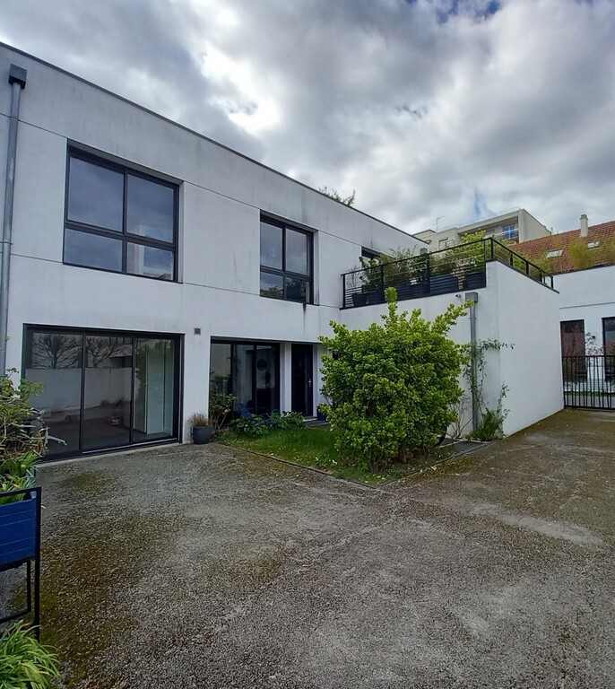 House in winter, with garage newly converted as new bedroom