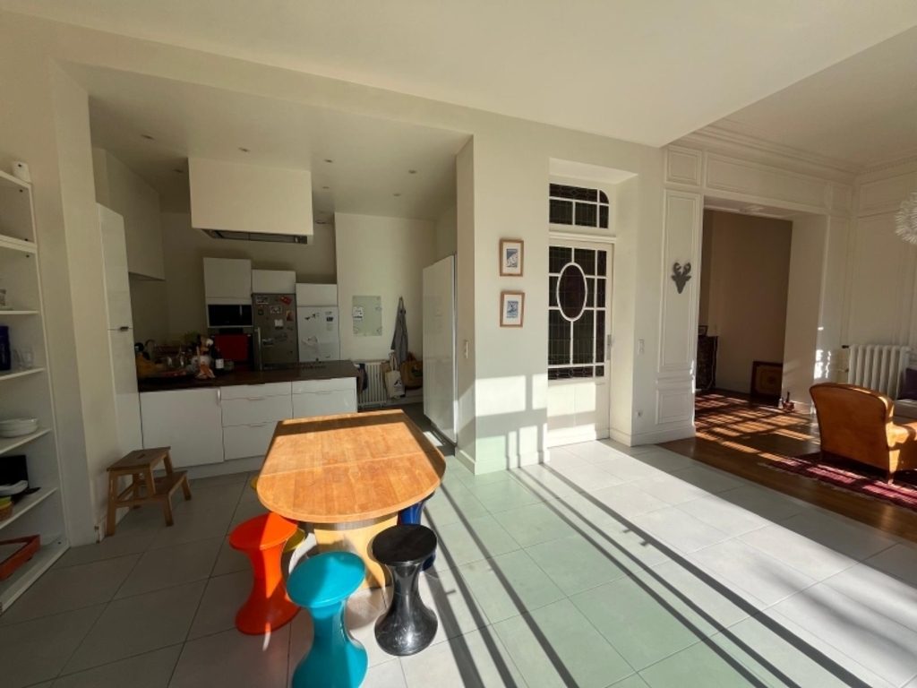 The kitchen, the 2nd living room and the adjoining dining room 