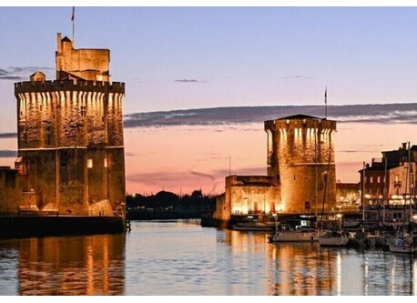 Towers city symbol on sunset
