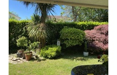 Appartement entouré de jardin