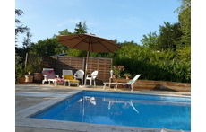 THE SWIMMING POOL AND ITS BEACH