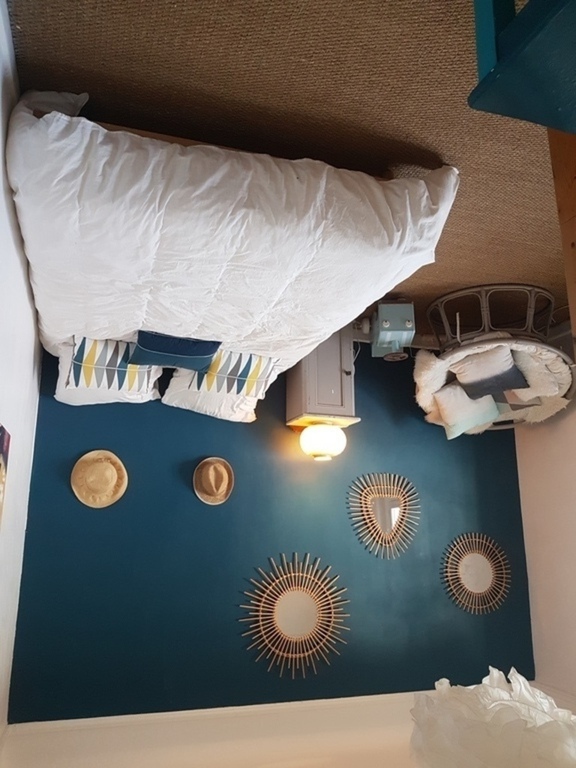 bedroom with a double bed and two bunk beds