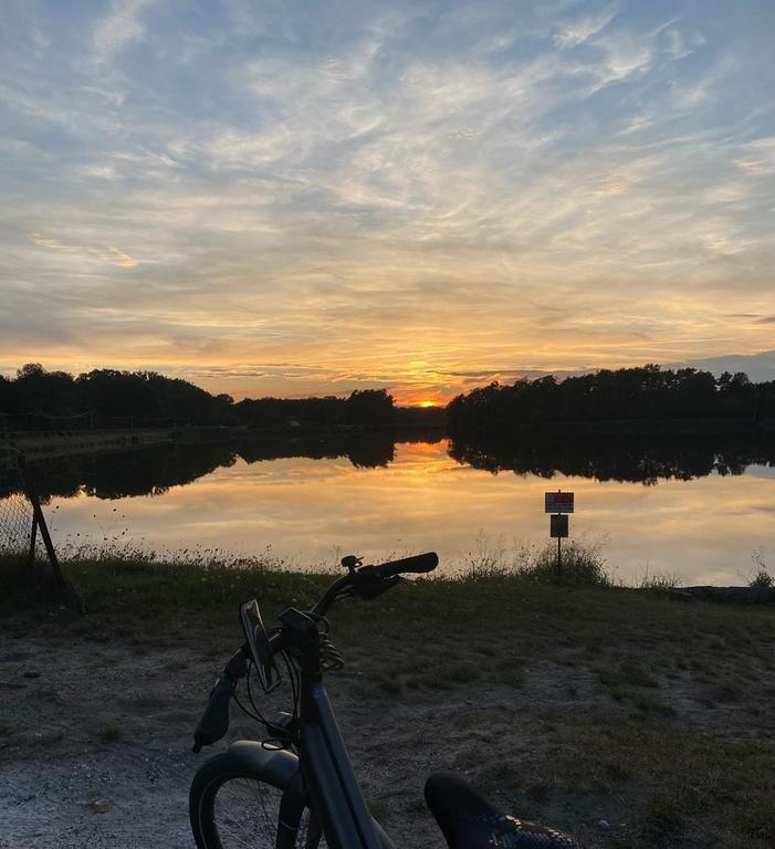 Sunset on the lake with bicycle