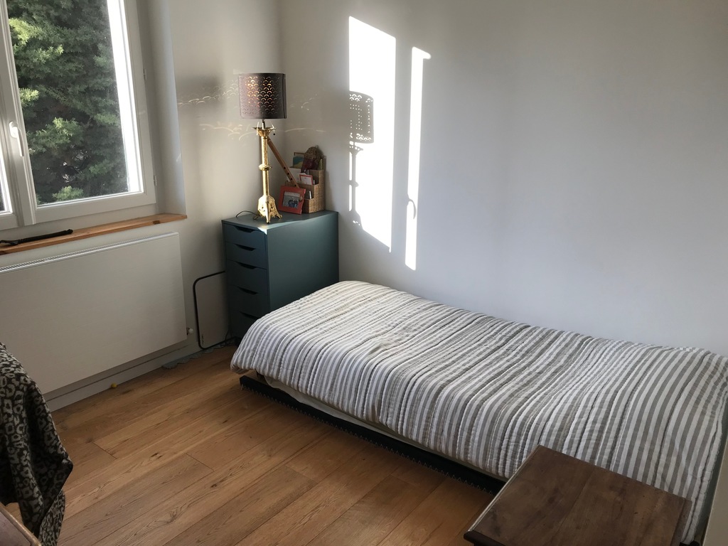 study room with single spare bed