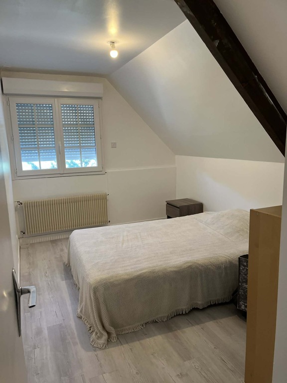 Friend's bedroom with double bed