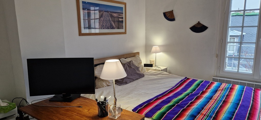 bedroom with king siez bed and computer station