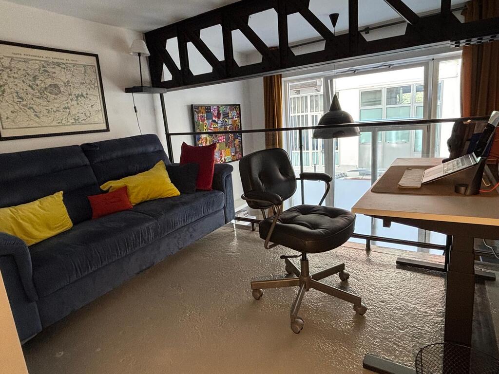 Mezzanine with sofa bed, desk and TV