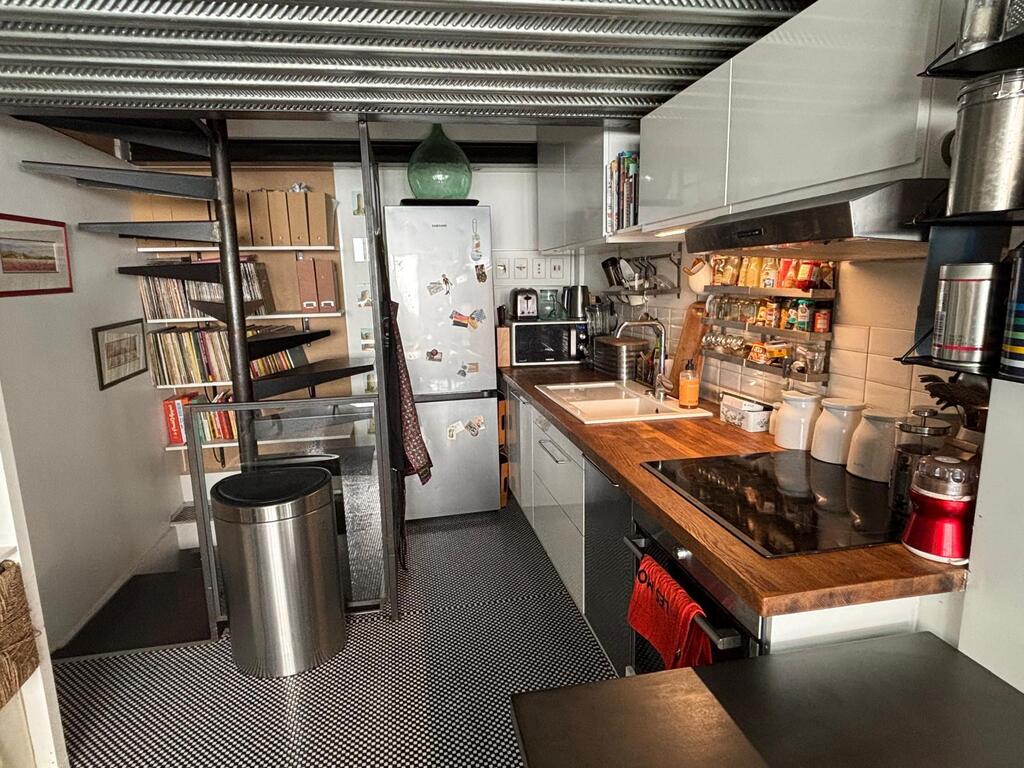 Kitchen, with stairs up and down (watch your head!)