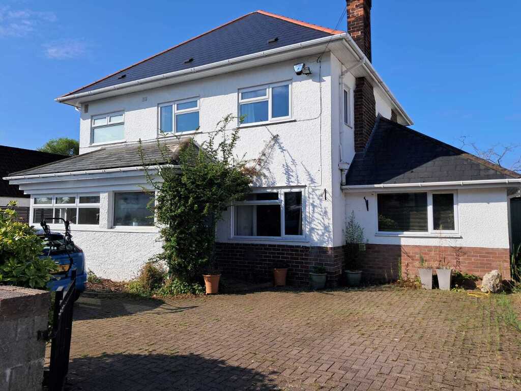 The front of our house with large driveway