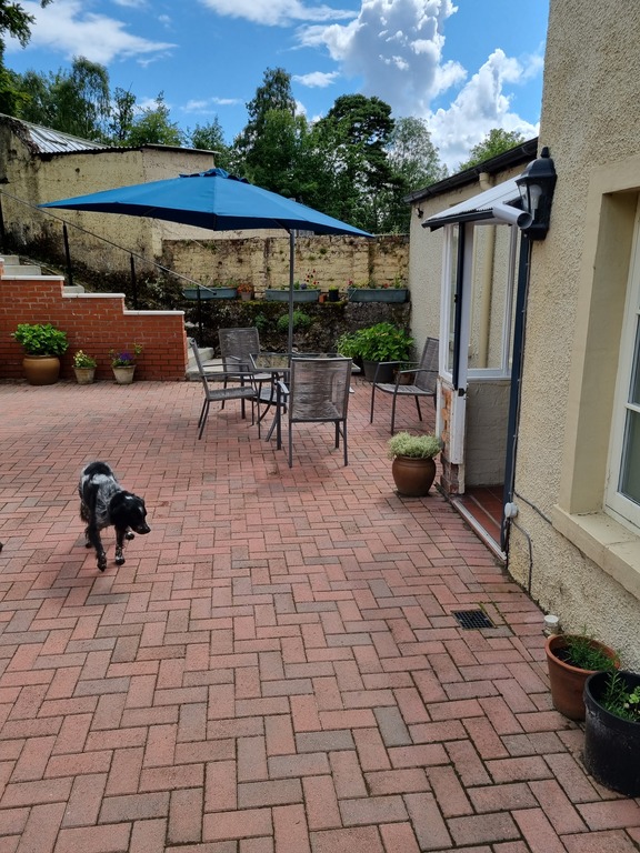 Sheltered sitting area out of kitchen door
