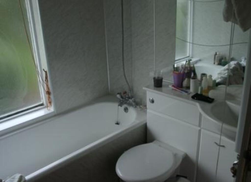 One of 3 bath /shower rooms
