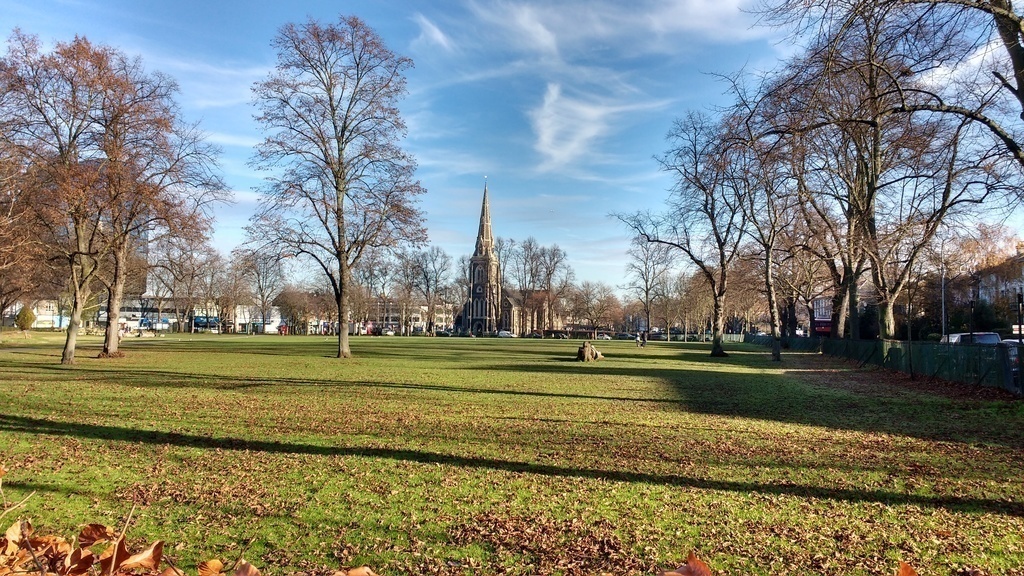 Chiswick High Road shops viewed across Turnham Green