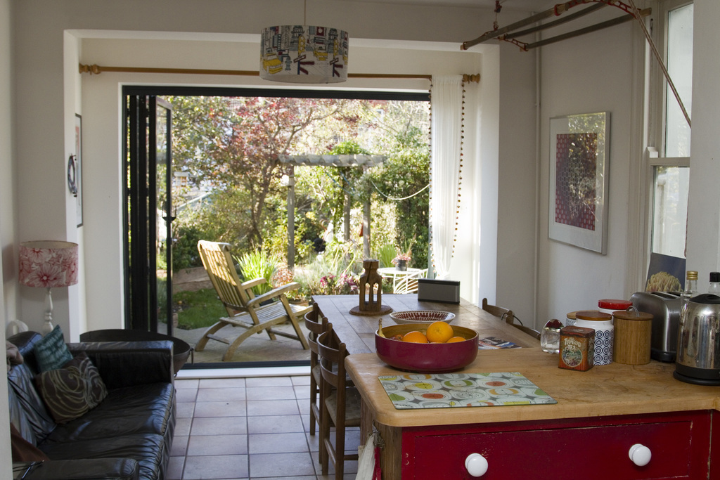 Kitchen with doors open to the garden