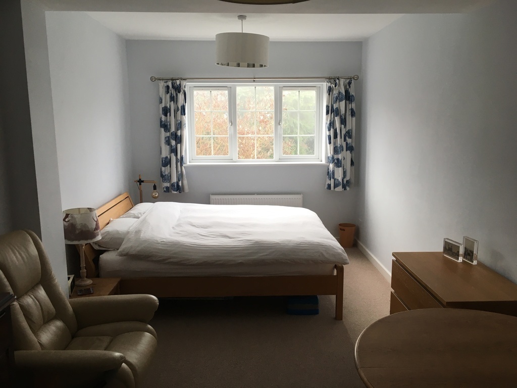 Spacious guest room with king size double bed