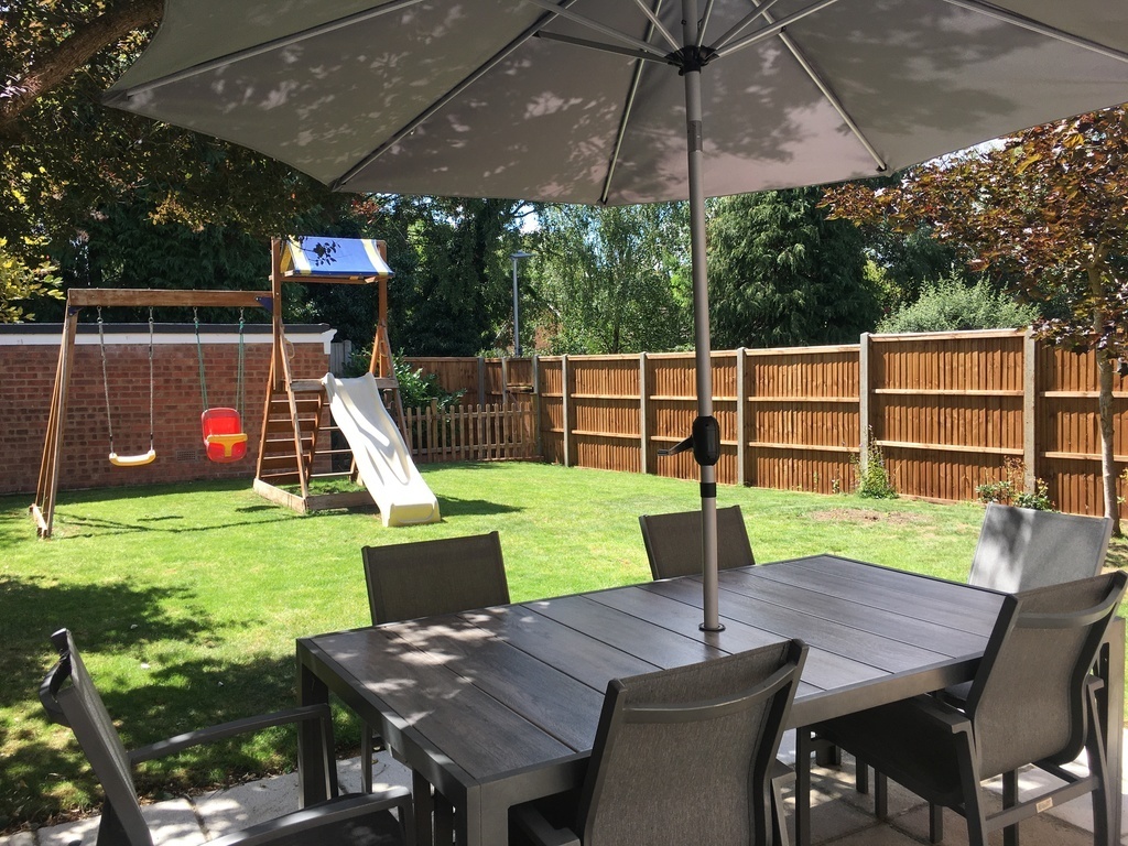 Our garden with patio for al fresco dining in spring / summer, and climbing frame for children to enjoy