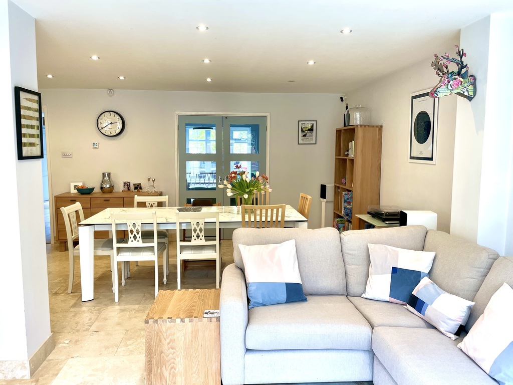 Sofa + dining areas, with doors through to sitting room