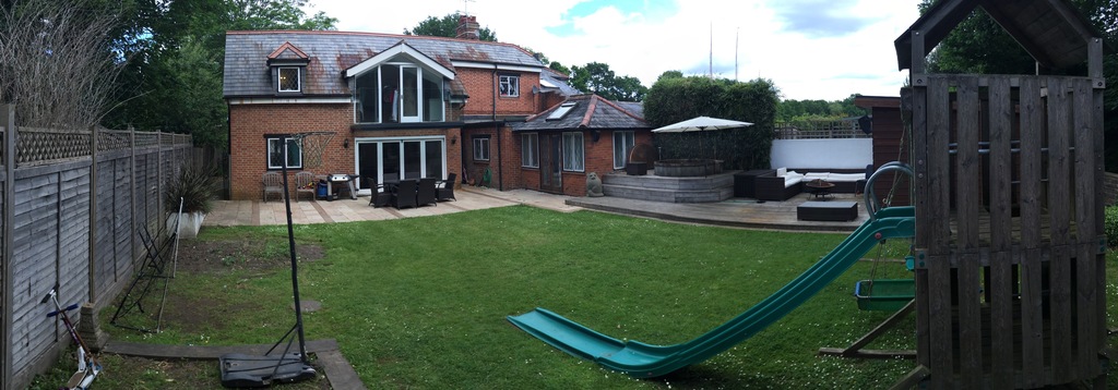 Our back garden and outdoor dining area, we have since moved the playframe