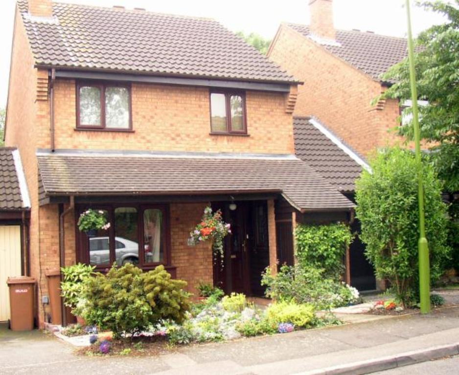 The front of our house with our drive and garage on the right.