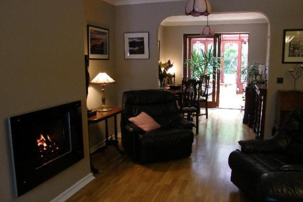 The living room looking into the dining room.