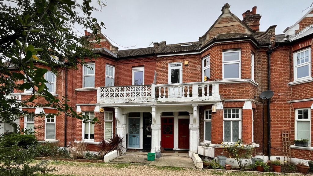 Edwardian terrace with communal front garden.