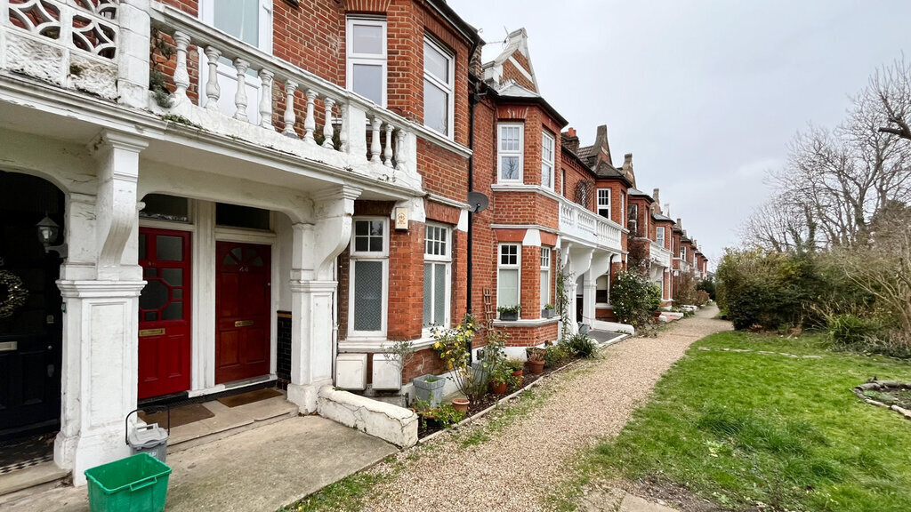 Edwardian terrace with communal front garden.