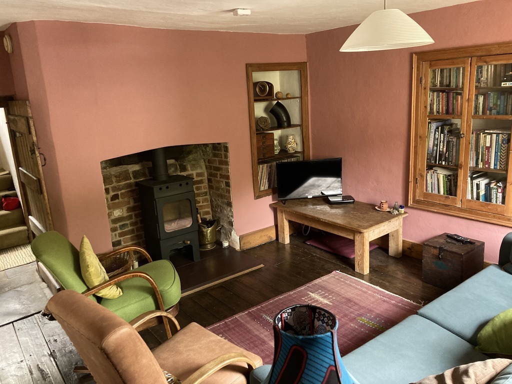 Main front room with wood burner.